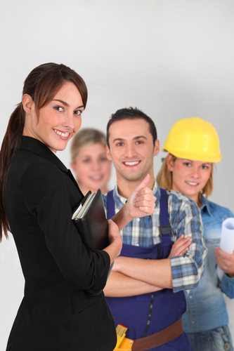 Group of young workers on white background